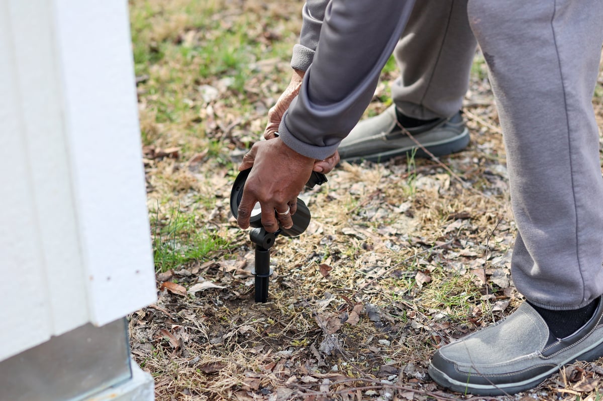 Installing a solar landscaping light in a lawn